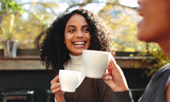 500x332_0030_Two women drinking coffee at a coffee shop Image Text: 500x332_0030_Two women drinking coffee at a coffee shop